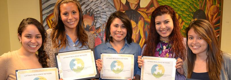 Five women smiling and holding Latinx Resilience Network certificates